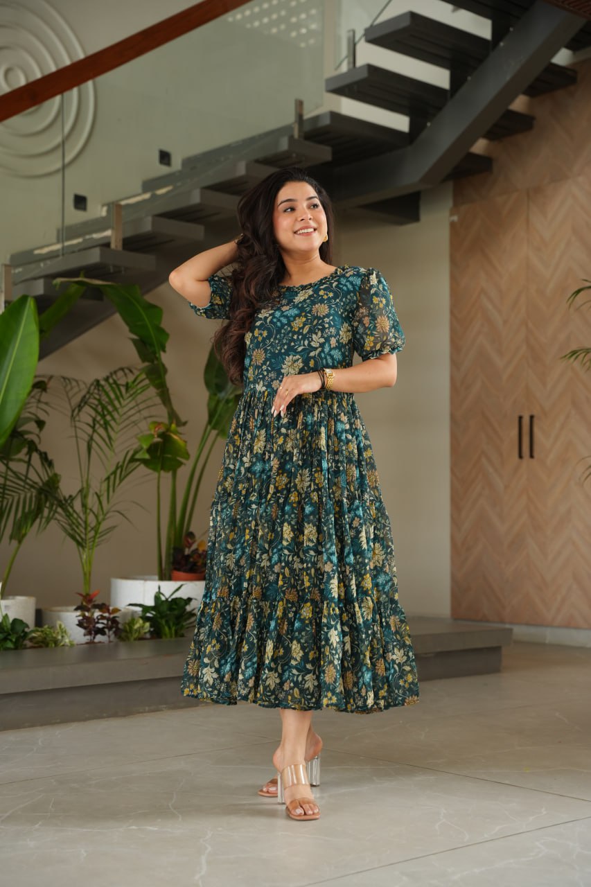 Vikarni Green Printed Anarkali Gown in faux georgette with 12-meter flair – perfect ethnic wear for women, long gown for women, printed gown for girls, Anarkali gown for wedding, georgette gown for festive wear, Indian dress for women, traditional wear for haldi ceremony, party wear gown online, readymade gown under 1000, stylish green ethnic gown for mehndi function.